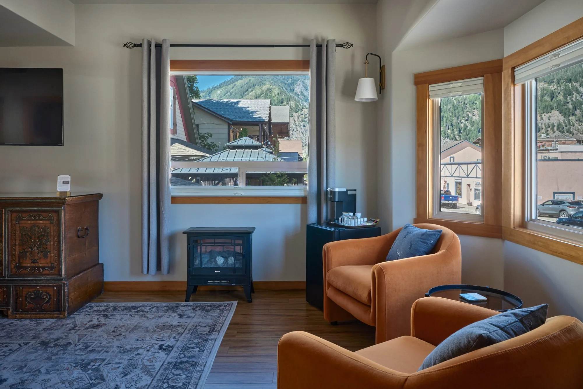Solstice Suite living room armchairs and fireplace